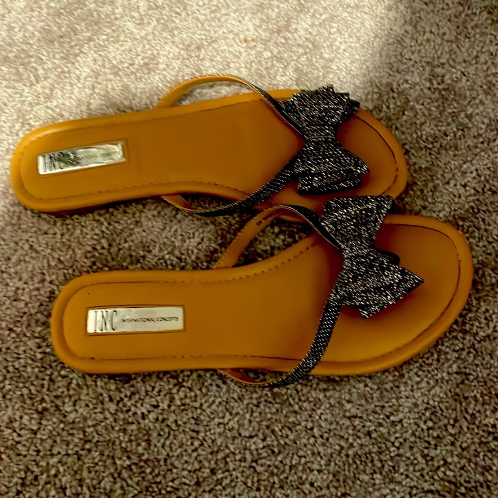 Bow tie flip flops.